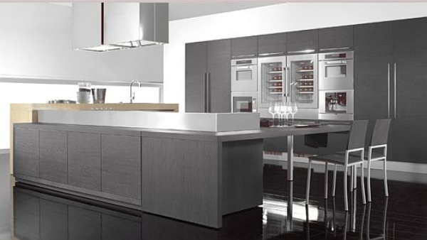 grey kitchen design with small eating area