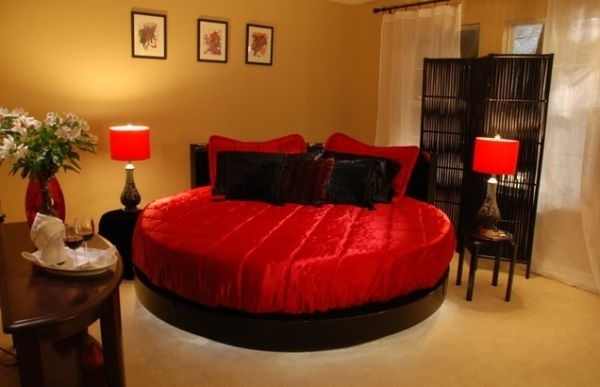 scarlet black romantic-round-bed-design