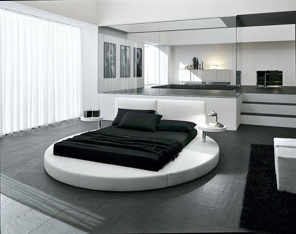 ultra modern bedroom-round-beds-clean lines