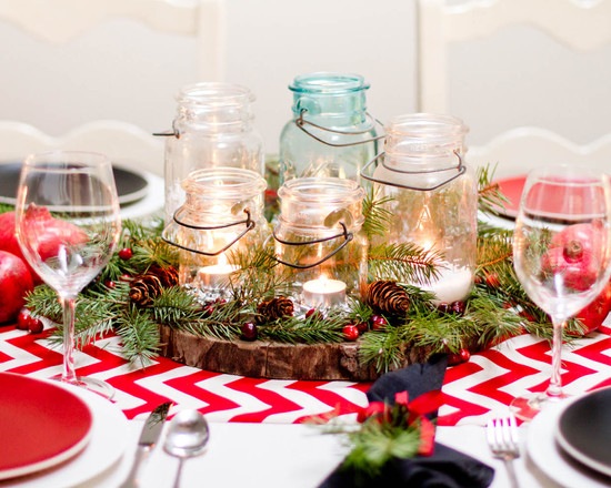 Glass jars candles and branches table