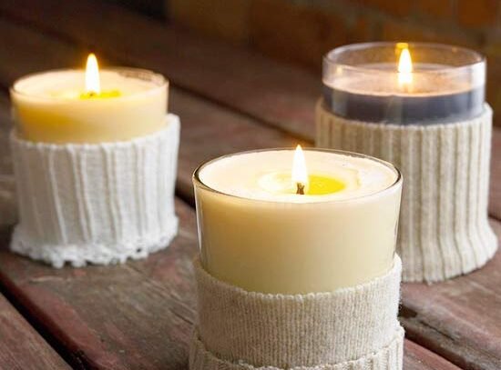 candles-in-cutted-sweater-sleeve