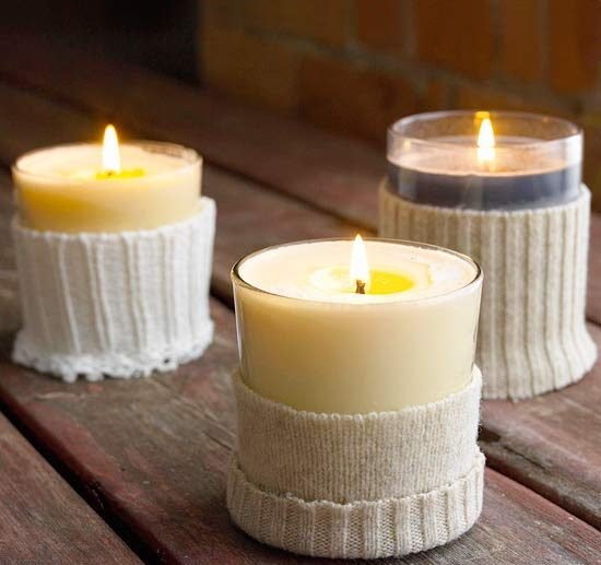 candles-in-cutted-sweater-sleeve