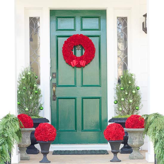 decoration ideas for your front door red wreath and vases red flowers