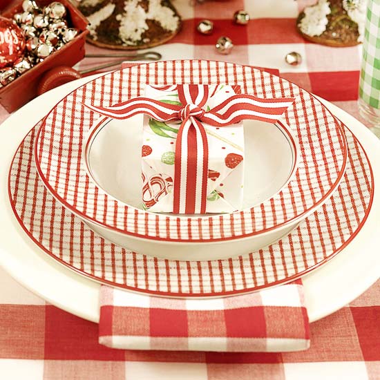 merry christmas napkin setting with wrapped present