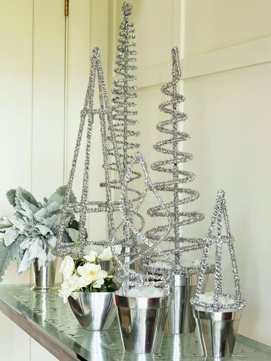 silver Christmas ornaments arrangemen with flowers