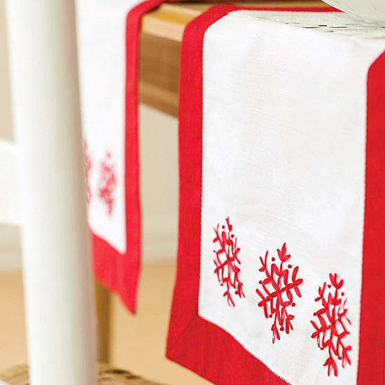 white red embroidered christmas table runner