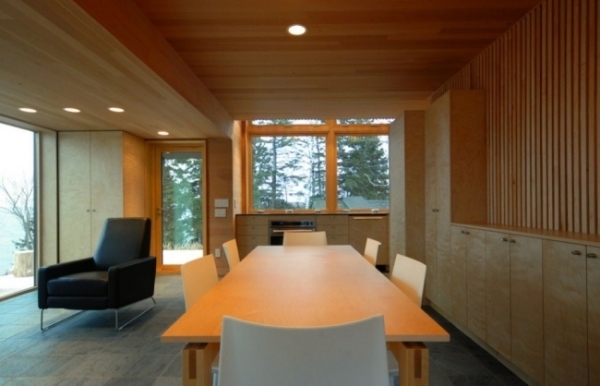 Minimalist interior design warm wood and glass Rierson Cabin