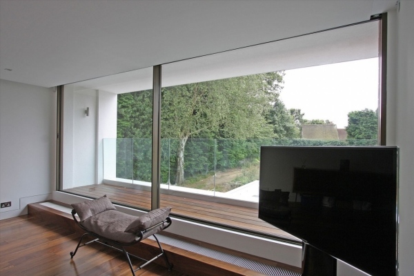 Oxted spacious glass walls bedroom
