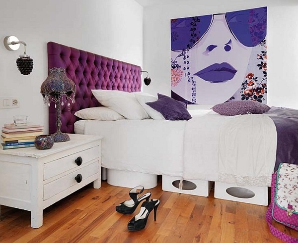 Plush headboard in purple adds a luxurious look in bedroom
