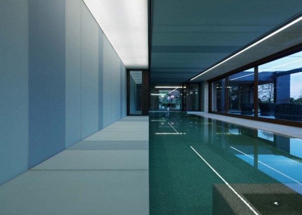 Villa swimming pool with glass walls 