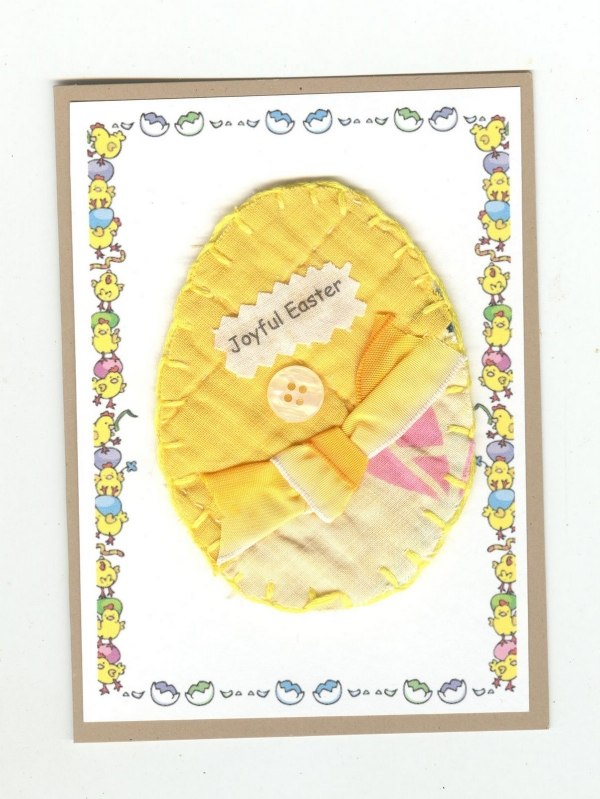 colorful yellow egg and ribbon