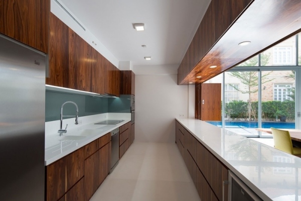 contemporary kitchen fuschia villa dark wood and white countertops