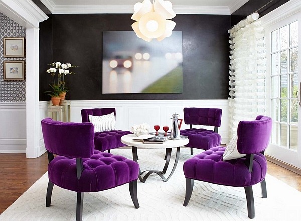 strong purple accents in sitting area contrast to black and white home decor