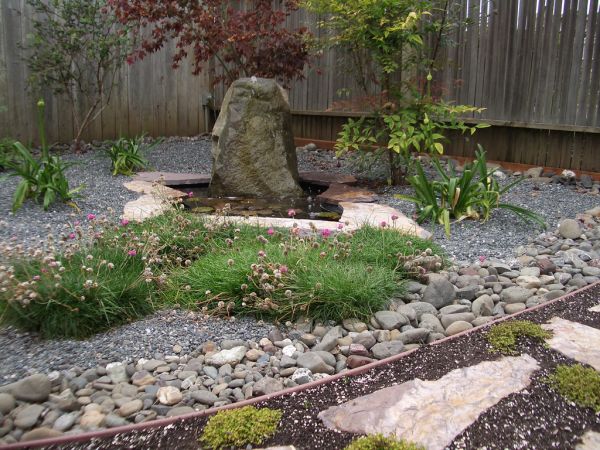 Japanese garden style gravel wooden fence rocks
