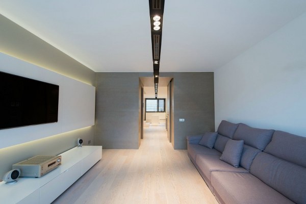Modern living room minimalist interior Cervantes house long grey sofa