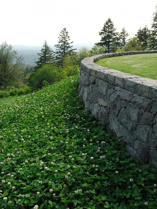 beautiful stone wall slope terrain landscaping design