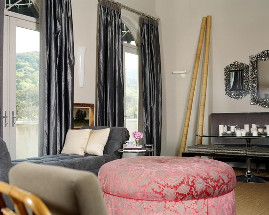 bedroom interior pink ottoman gray curtains