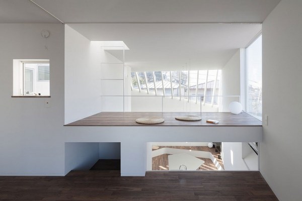minimalist interior wooden platform ladder to the roof
