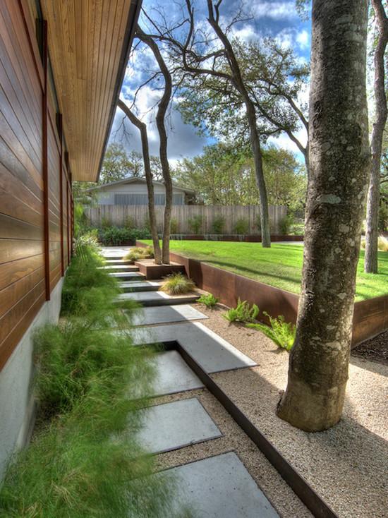contemporary garden design walls concrete slabs path