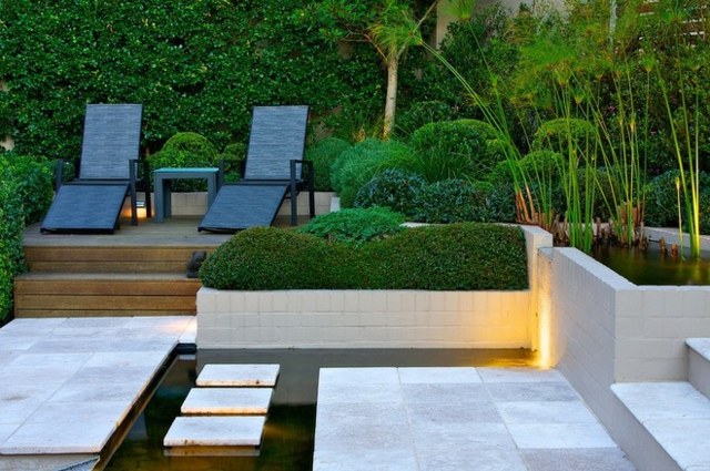 creative landscape design ideas hillside garden white retaining wall terraces