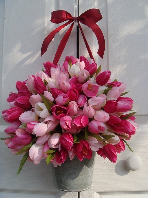 cute front door easter wreath tulips in bucket red ribbon