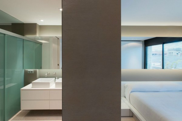 minimalist bedroom white vanity double sinks Cervantes House