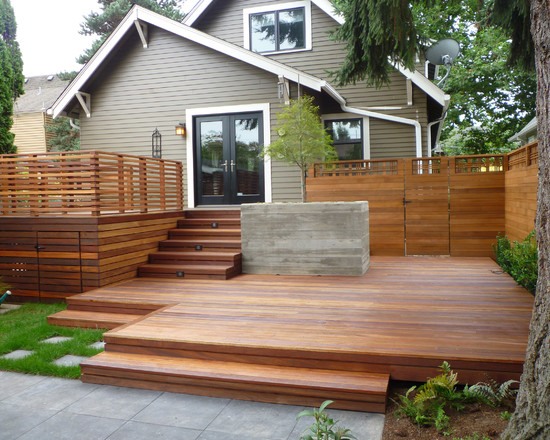 modern home exterior levelled wooden deck