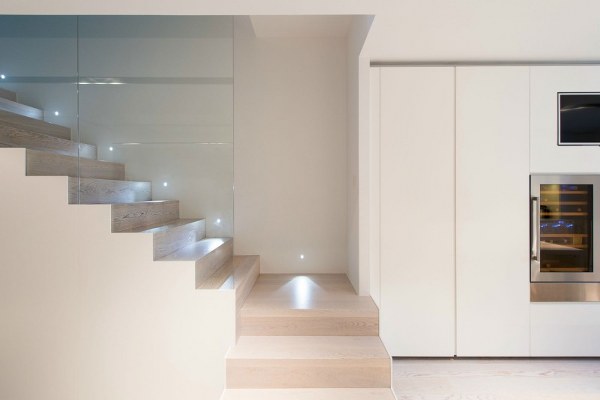 modern home interior glass panel wooden steps white kitchen Cervantes House