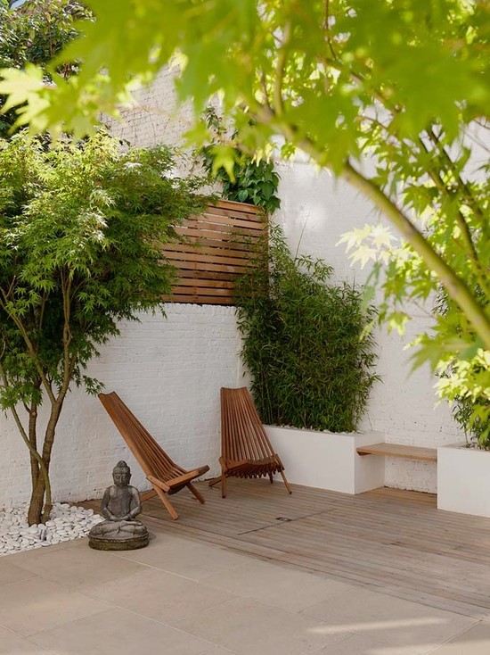 modern patio design deck bamboo budha statue