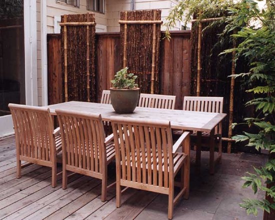 contemporary patio furniture bamboo garden divider wooden deck garden dining area
