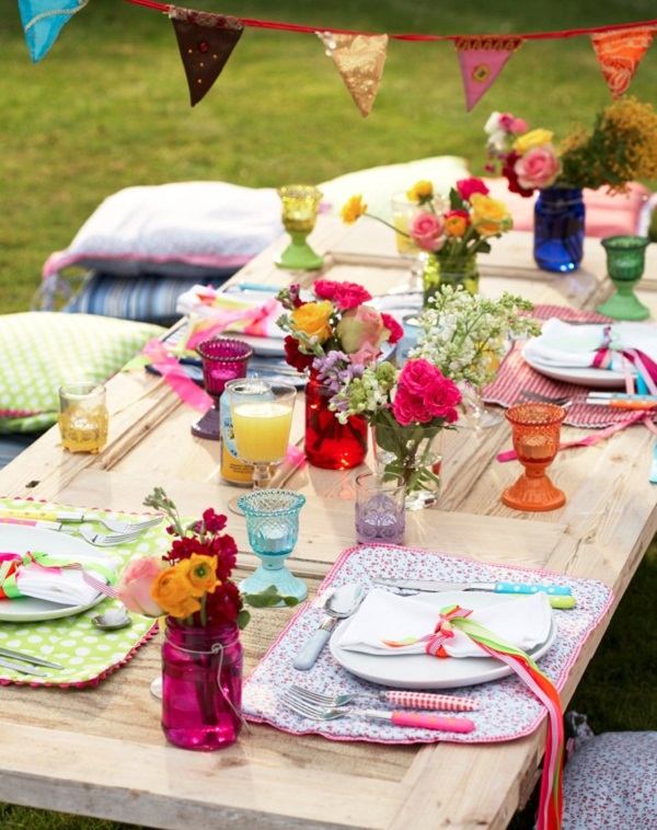 outdoor easter party table setting idea tulip centerpiece flowers bright colorful flowers