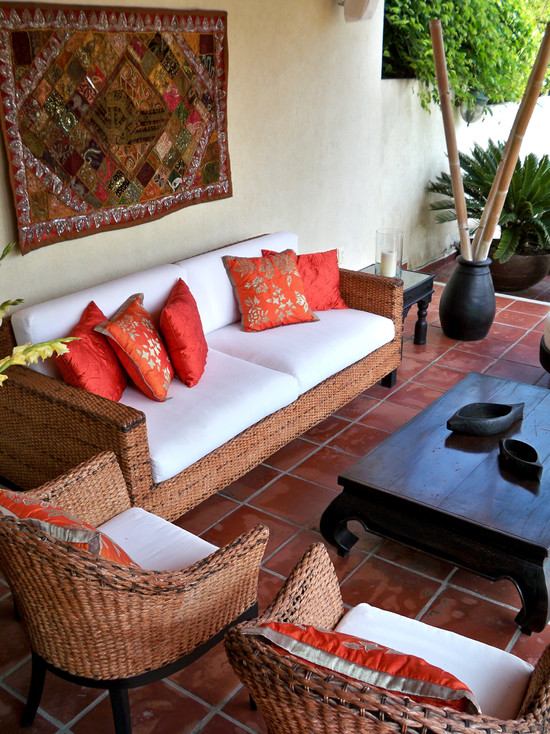patio-decoration-ideas-bamboo-poles-sofa-terracotta-tiles