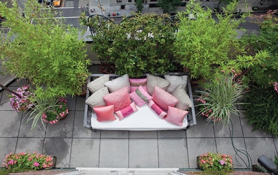 rooftop garden ideas chairs trees in pots