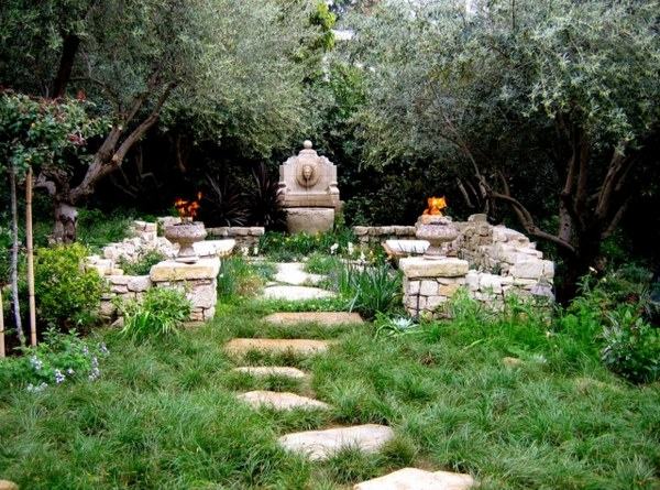 secret garden design mediterranean style natural stone seating area bench