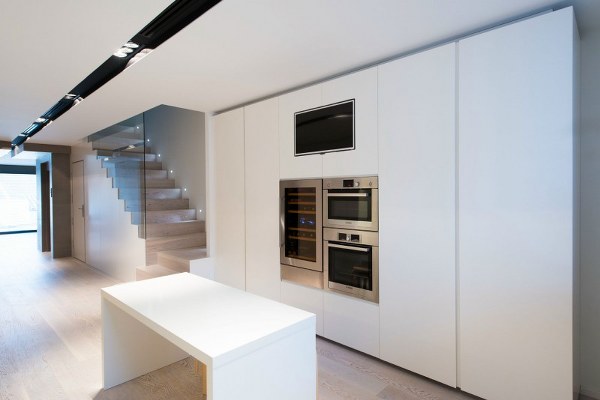 stylish minimalist white kitchen kitchen island built in oven