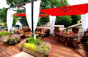wonderful-contemporary-wooden-deck-flowers-red-shades-dining-area