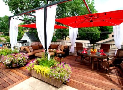 wonderful-contemporary-wooden-deck-flowers-red-shades-dining-area