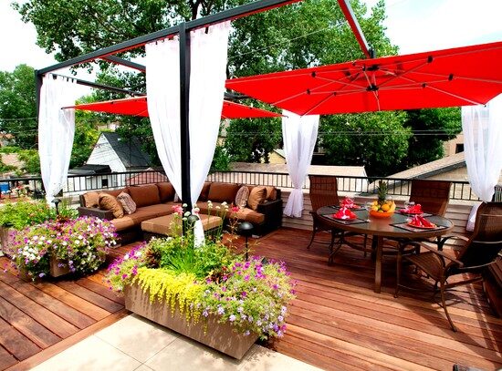 wonderful-contemporary-wooden-deck-flowers-red-shades-dining-area