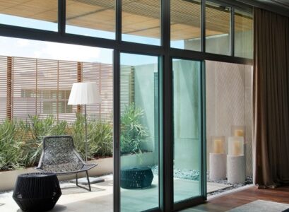 Balcony-furniture-chair-table-glass-window-bedroom Casa-Cor