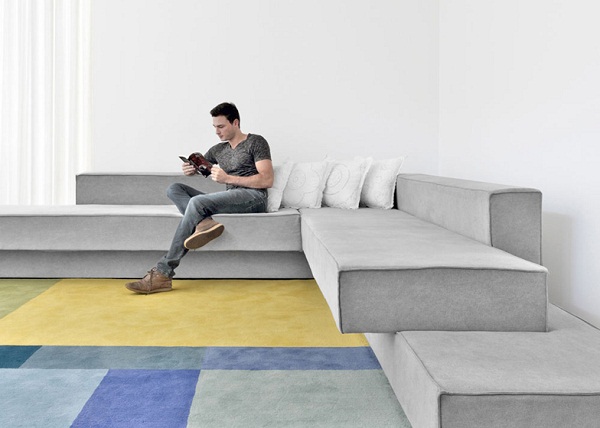 Cantilevered sofa by Paulo Kobylka modern living room furniture grey upholstery