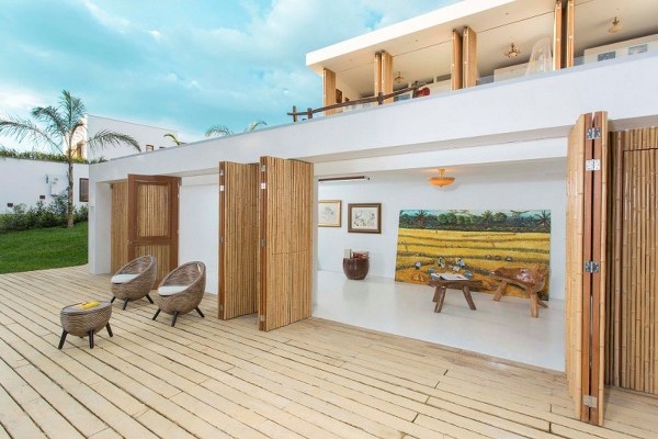 Gallery house with open wooden terrace original chair design