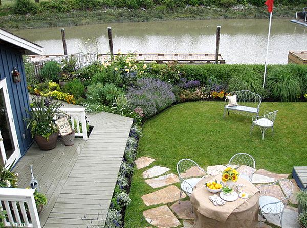 Garden-design-ideas-backyard-shed-wooden-deck-outdoor-seating-perennials