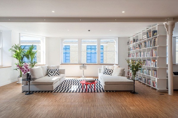 Living room design ideas white wall shelving system stripe carpet comfortable sofa
