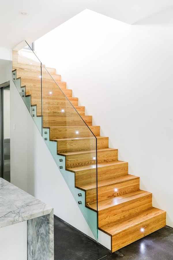 Modern interior design stairs glass railing wooden steps
