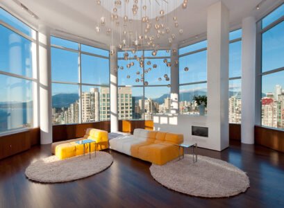 Round-area-rug-dream-living-room-upholstered-furniture-fireplace-glass-chandelier