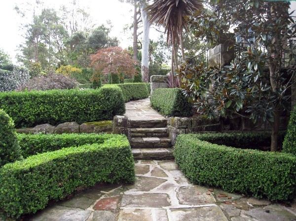 beautiful landscape design ideas stone paths trimmed hedge