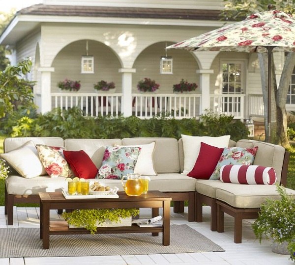 chic-garden-furniture-sectional-sofa-white-upholstery-decorative-pillows-low-coffee-table