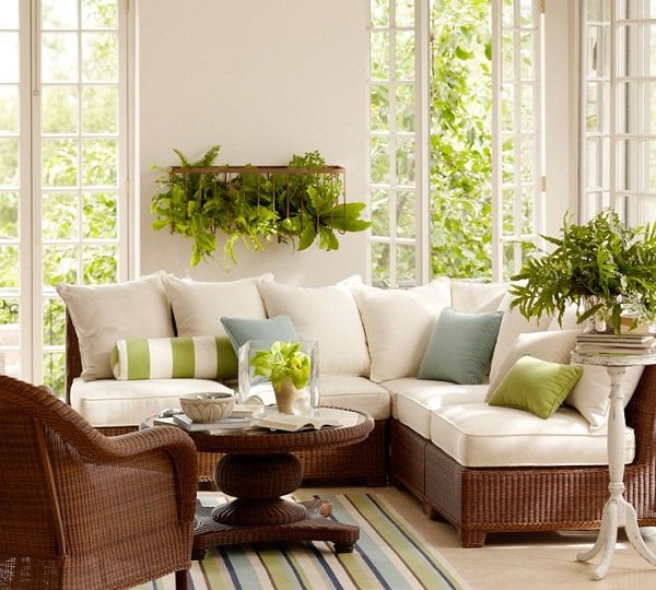 chic-patio-furniture-sofa-armchair-coffee-table-white-upholstery-cushions-carpet-color-accents