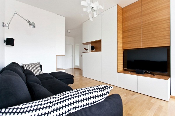 contemporary interior white walls wood wall accent black sofa