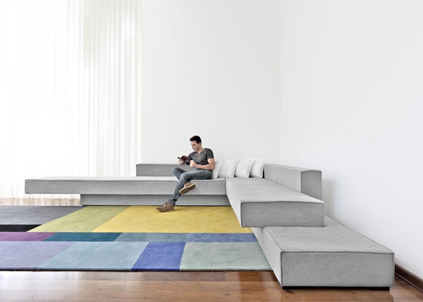 contemporary sofa design L shape cantilevered couch by Paulo Kobylka
